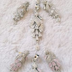 Pendent and earrings